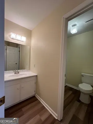 a bathroom with a sink and a toilet