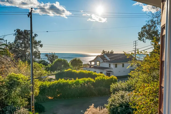 an aerial view of multiple house with outdoor space