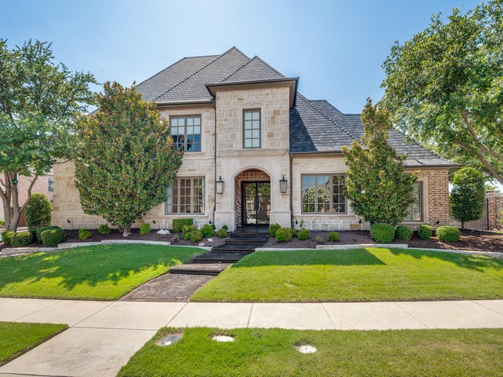 6787 Trailing Oaks Drive Frisco, TX 75034 - Photo 1 of 1 a front view of a house with a yard and trees