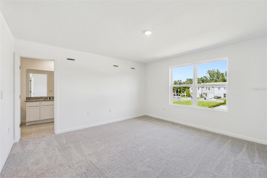 3613 Spire Drive Davenport, FL 33837 - Photo 11 of 20 a view of an empty room with a window