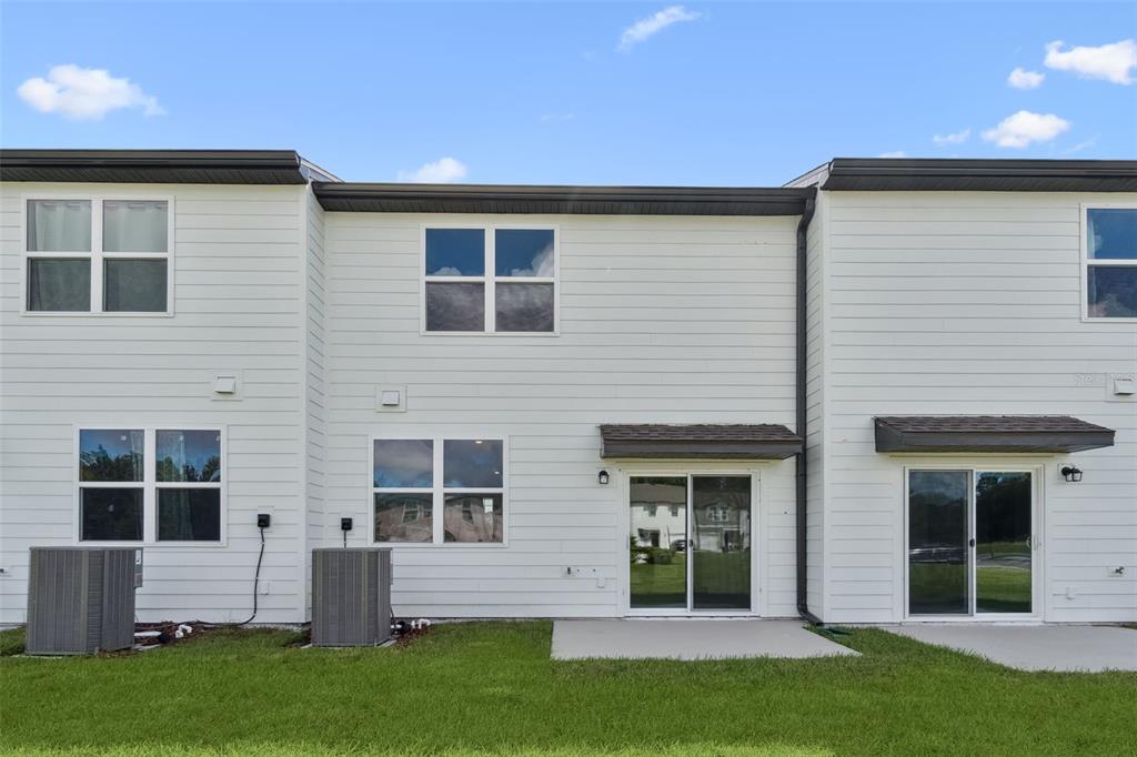 3613 Spire Drive Davenport, FL 33837 - Photo 15 of 20 front view of a house with a yard