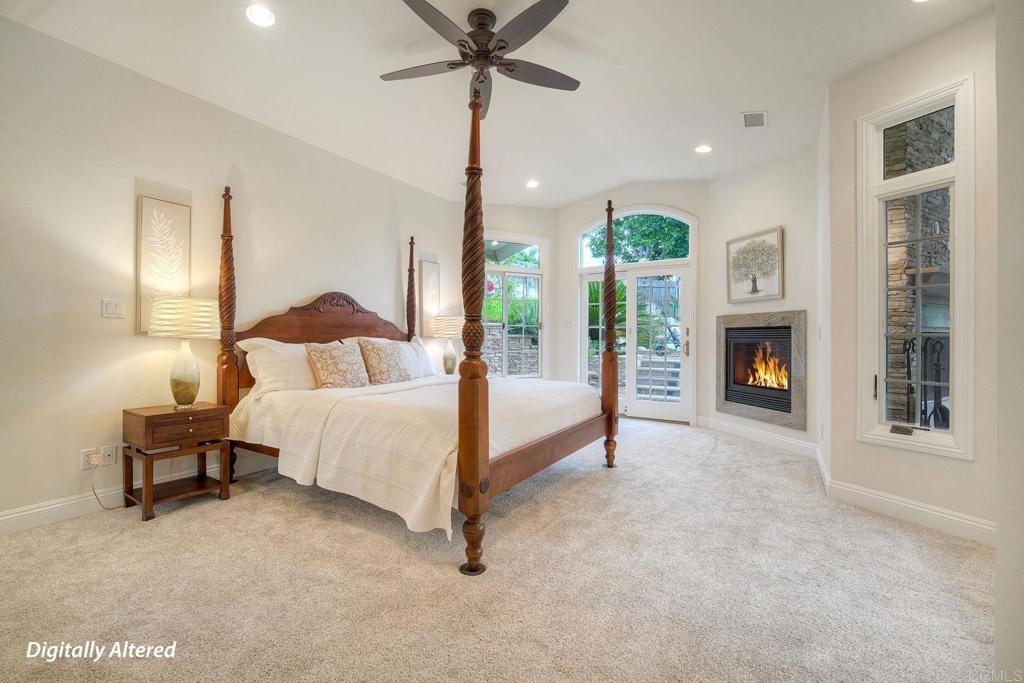 13253 Edina Way Poway, CA 92064 - Photo 26 of 55 Fire was added to photo.Vaulted ceiling,ceiling fan,gas fireplace,2 sliders to patio, walk in closet