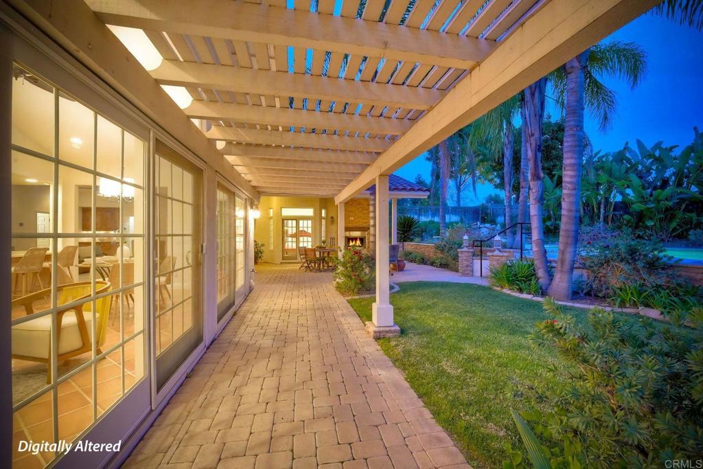 13253 Edina Way Poway, CA 92064 - Photo 34 of 55 Walk way from sunroom end of house to back patio