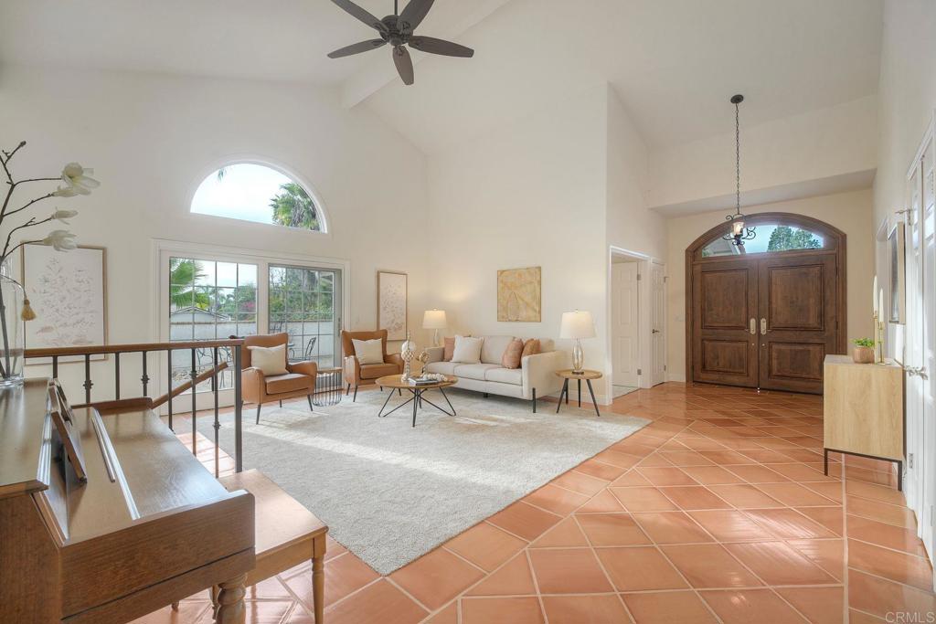 13253 Edina Way Poway, CA 92064 - Photo 6 of 55 Double wooden door entry. One of two primary bedrooms to the right and office/bedroom on the left