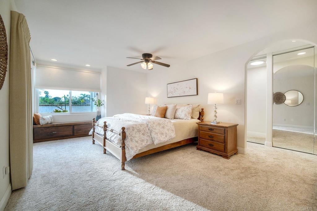 13253 Edina Way Poway, CA 92064 - Photo 9 of 55 One of two primary bedroom, slider to back patio, built in window seat, ceiling fan