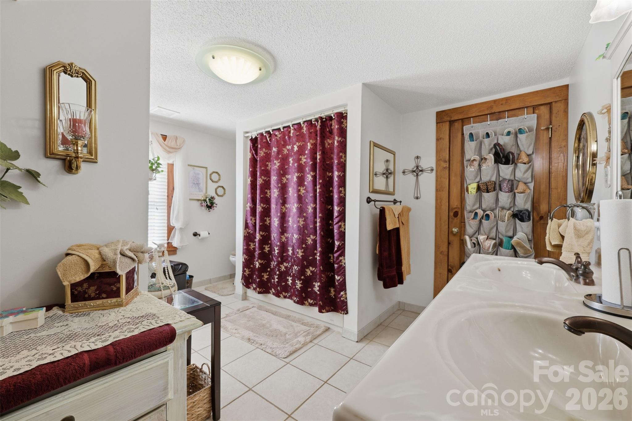 176-174 Oak Hollow Road Union Grove, NC 28689 - Photo 29 of 48 a bedroom with a bed and a dresser