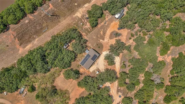 an aerial view of residential house with outdoor space