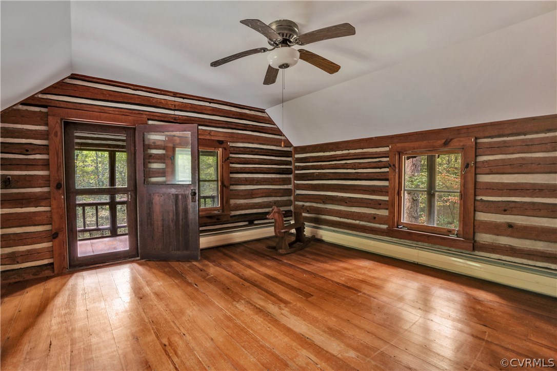 1444 Genito Road Manakin-Sabot, VA 23103 - Photo 16 of 47 wooden floor in an empty room with a window