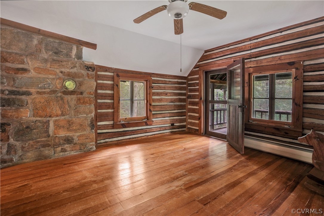 1444 Genito Road Manakin-Sabot, VA 23103 - Photo 17 of 47 wooden floor in an empty room with a window