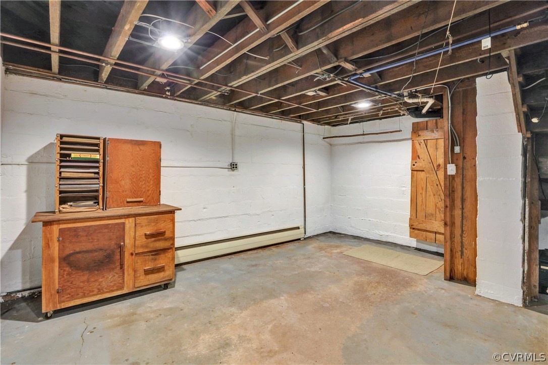 1444 Genito Road Manakin-Sabot, VA 23103 - Photo 26 of 47 a view of an empty room with wooden cabinets