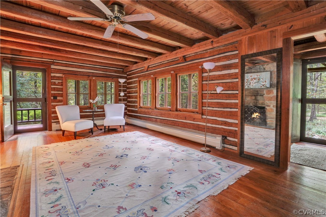 1444 Genito Road Manakin-Sabot, VA 23103 - Photo 3 of 47 a living room with furniture a wooden floor and next to a window