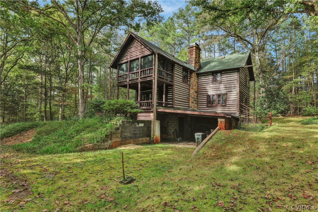 1444 Genito Road Manakin-Sabot, VA 23103 - Photo 32 of 47 a view of a house with a yard