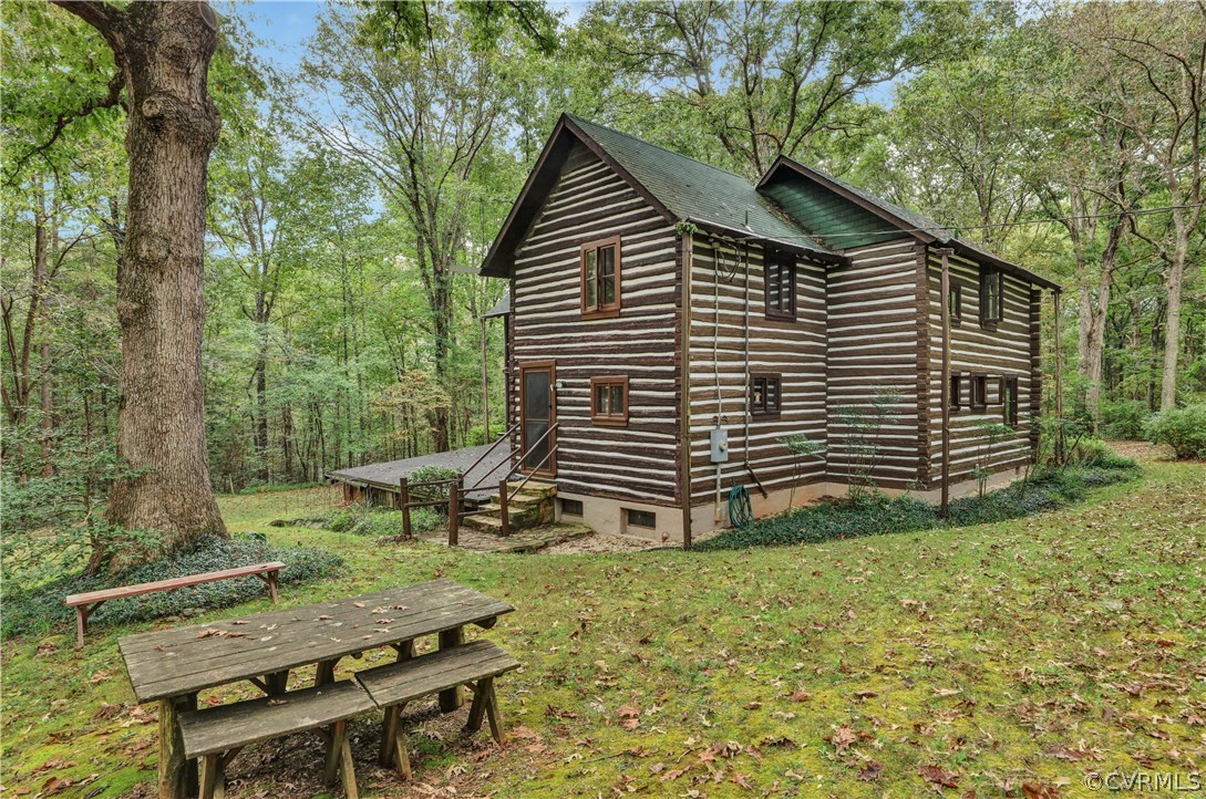 1444 Genito Road Manakin-Sabot, VA 23103 - Photo 35 of 47 a view of a house with backyard and chairs