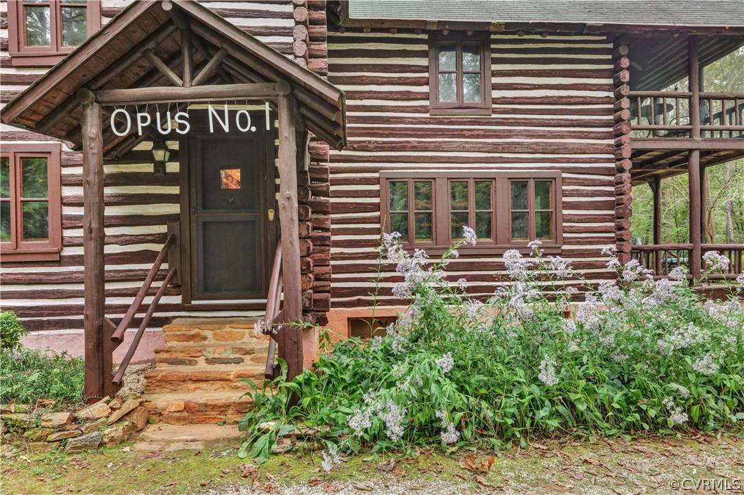 1444 Genito Road Manakin-Sabot, VA 23103 - Photo 46 of 47 a front view of a house with garden