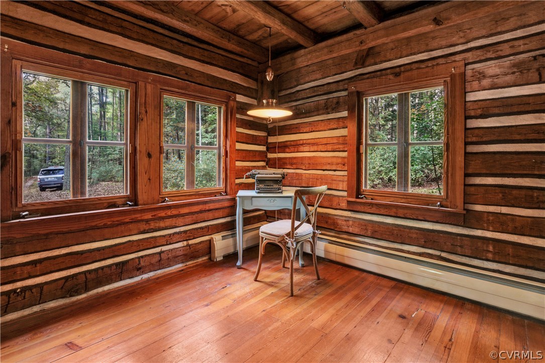 1444 Genito Road Manakin-Sabot, VA 23103 - Photo 6 of 47 a view of a room with wooden floor and windows