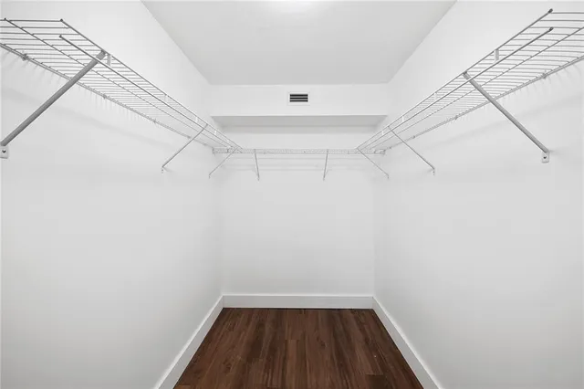 a view of a room with racks on the wall