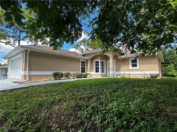 a house view with a garden space