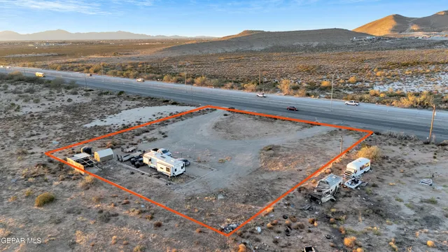 a view of ocean and a mountain