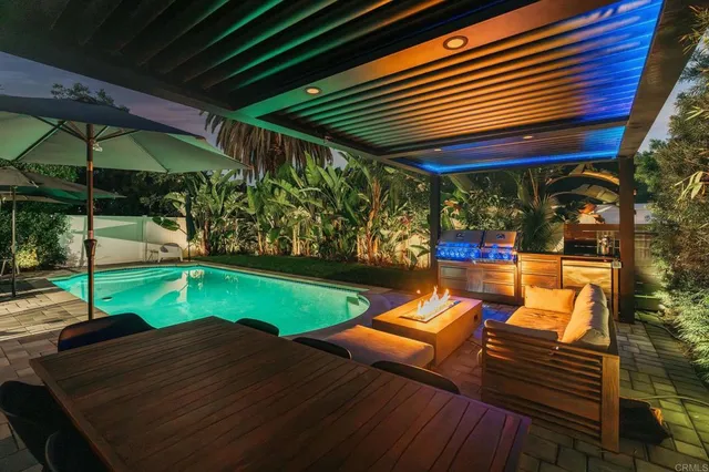 a view of outdoor space deck patio and swimming pool