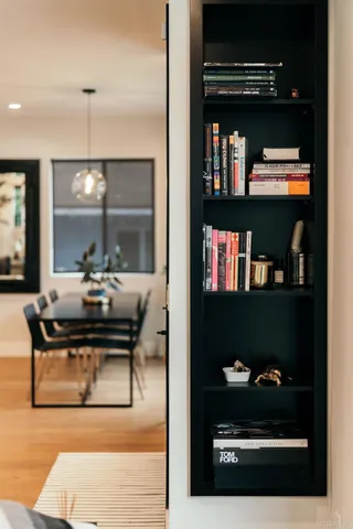 a view of a workspace with furniture and a couch