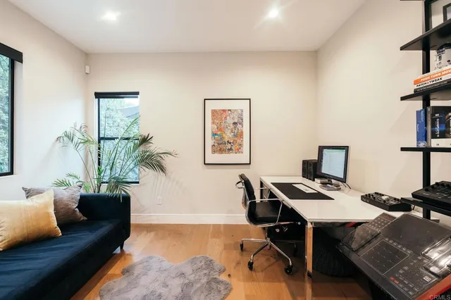 a bathroom with 2 sink and a mirror