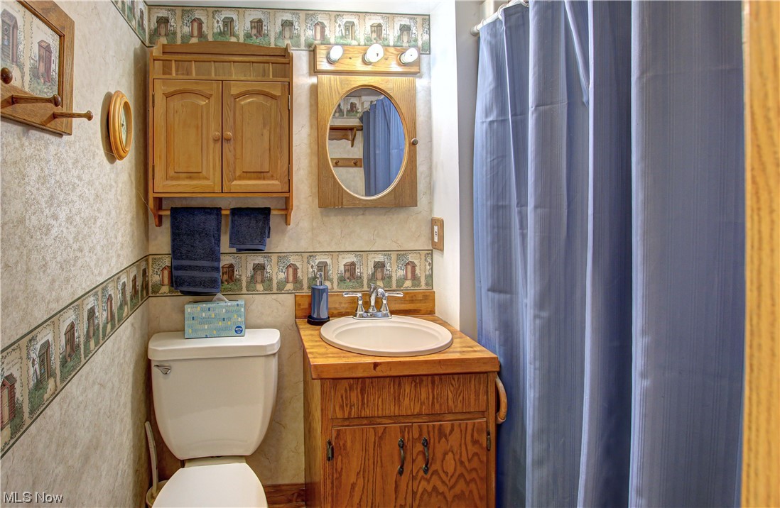 3946 Poe Road Medina, OH 44256 - Photo 13 of 35 Bathroom with vanity and mirror