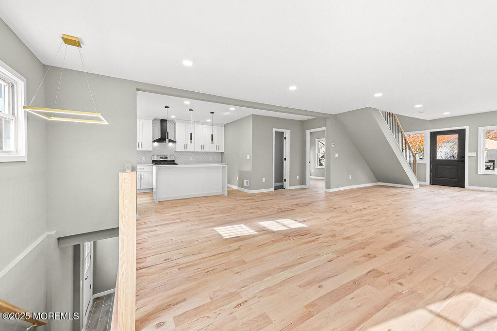 940 Grove Avenue Old Bridge, NJ 08879 - Photo 11 of 48 a view of kitchen and hall with wooden floor