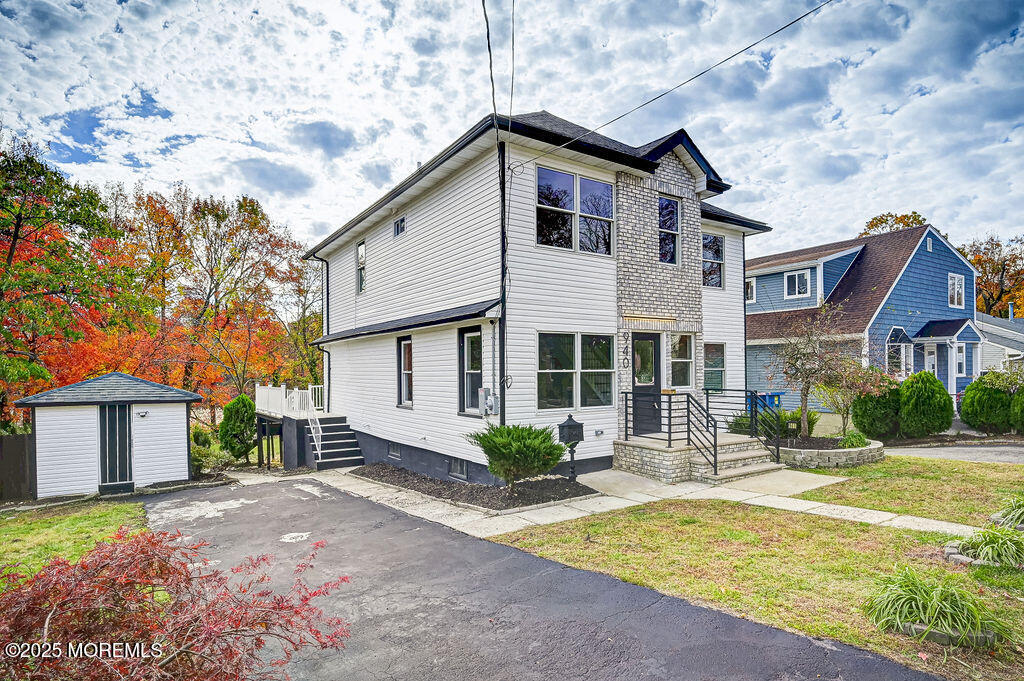 940 Grove Avenue Old Bridge, NJ 08879 - Photo 2 of 48 a front view of a house with garden