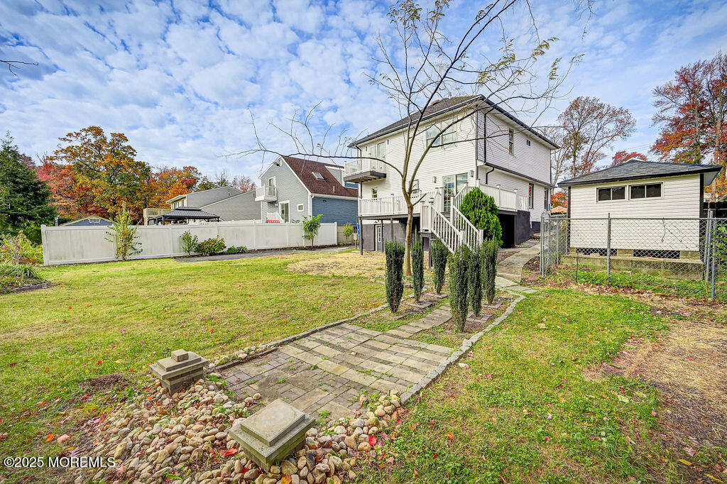 940 Grove Avenue Old Bridge, NJ 08879 - Photo 43 of 48 a front view of a house with a yard