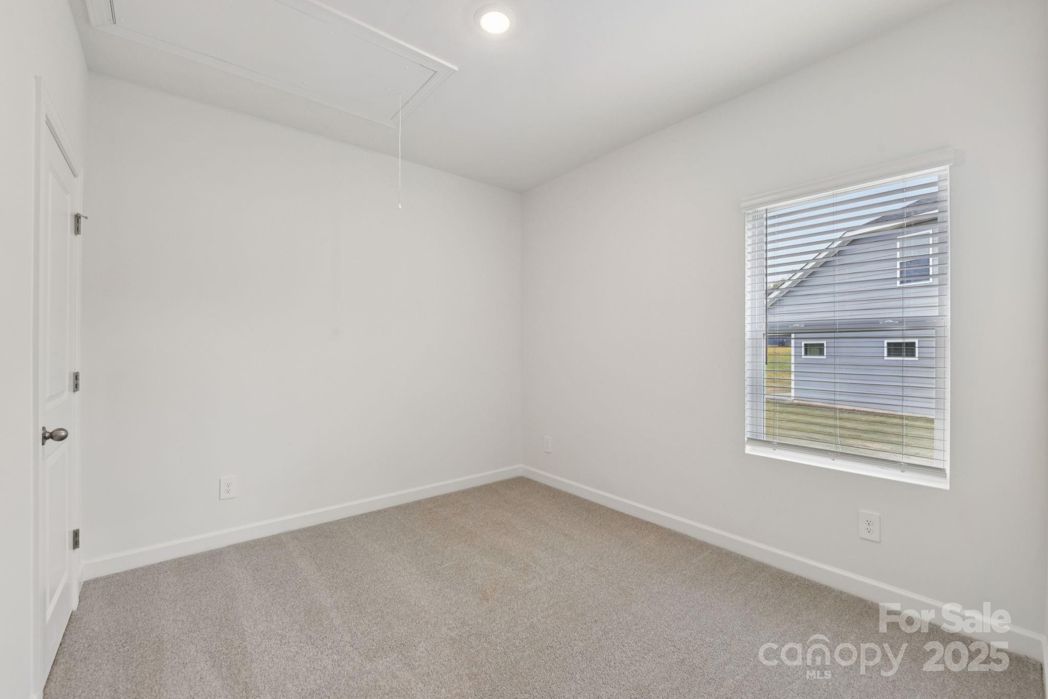 712 Palmer Pendleton Way York, SC 29745 - Photo 14 of 36 an empty room with a window