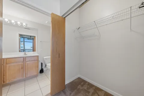 a bathroom with a sink toilet and tub