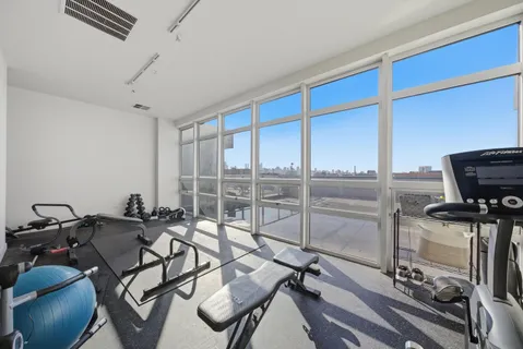 a view of a workspace with furniture