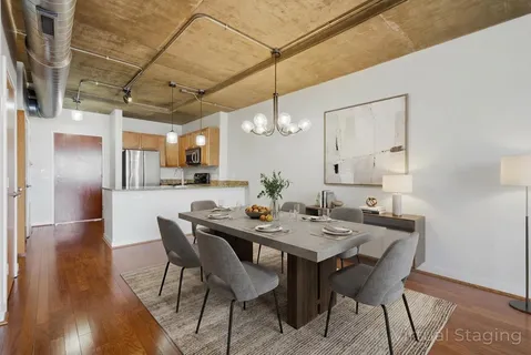 a view of a dining room with furniture