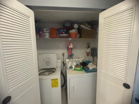 12989 Odessa Trail, Unit 3 Wellington, FL 33414 - Photo 24 of 32 a utility room with dryer and washer