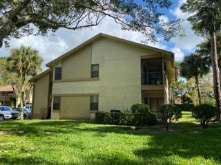 12989 Odessa Trail, Unit 3 Wellington, FL 33414 - Photo 30 of 32 a view of a house with a yard
