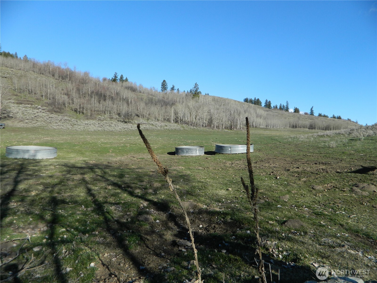 111 Tbd Ellemeham Mountain Ridge Road Loomis, WA 98827 - Photo 11 of 17 a view of a field with an ocean in the background