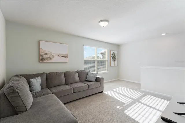a bathroom with a sink toilet and a mirror
