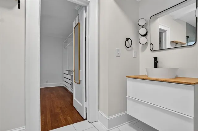 a hallway with cabinets