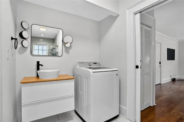 a utility room with dryer and washer
