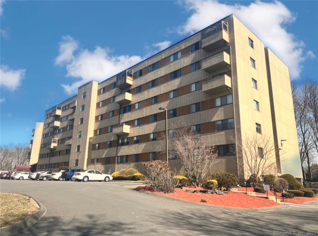 58 Putter Drive, Unit LL4 Wallingford, CT 06492 - Photo 1 of 1 a front view of a building