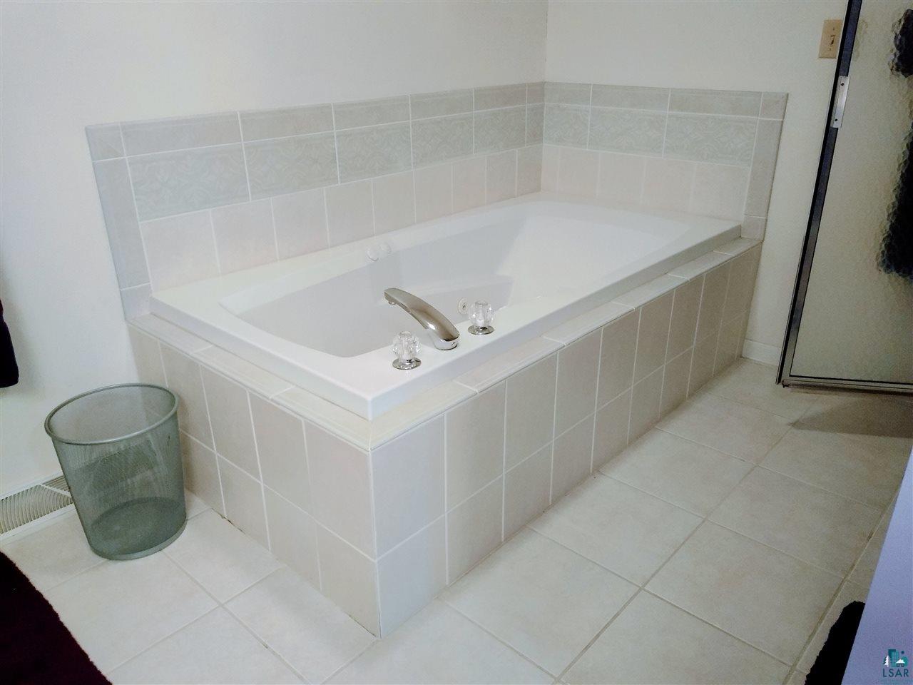 34545 Pumphouse Road, Unit 305 Bayfield, WI 54814 - Photo 21 of 38 Bathroom has new toilets, faucets, hardware, paint job