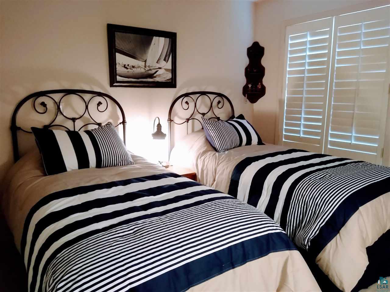 34545 Pumphouse Road, Unit 305 Bayfield, WI 54814 - Photo 10 of 38 Main level bedroom