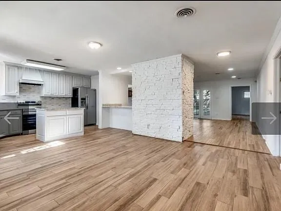 a view of a garden with an outdoor space