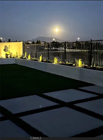 a view of swimming pool from a balcony