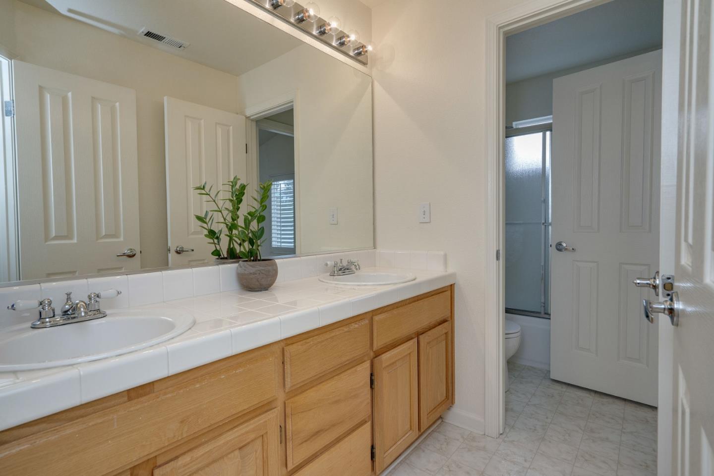 120 Patrick Way Half Moon Bay, CA 94019 - Photo 16 of 22 a bathroom with a sink and a mirror