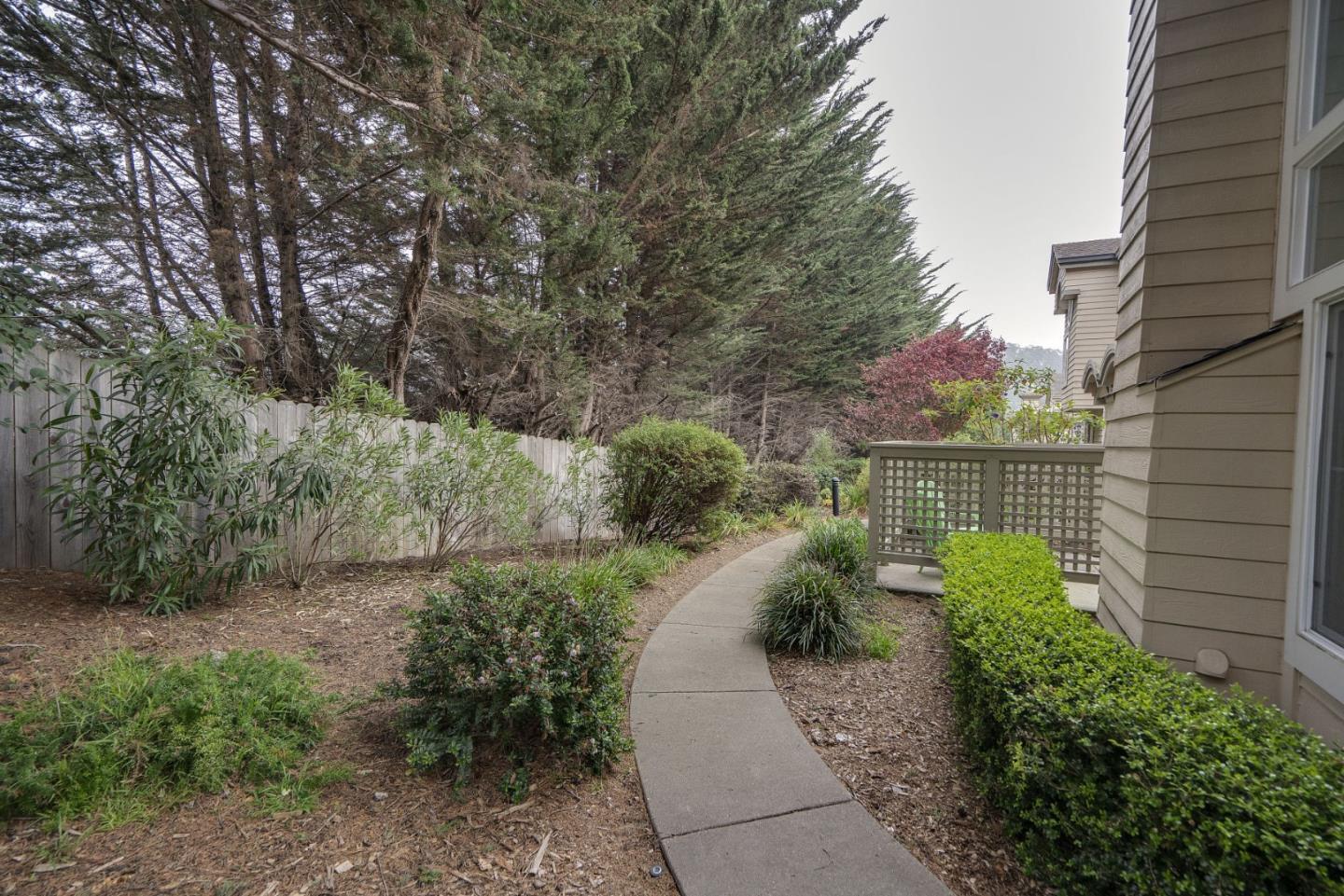 120 Patrick Way Half Moon Bay, CA 94019 - Photo 21 of 22 a view of a backyard with pathway