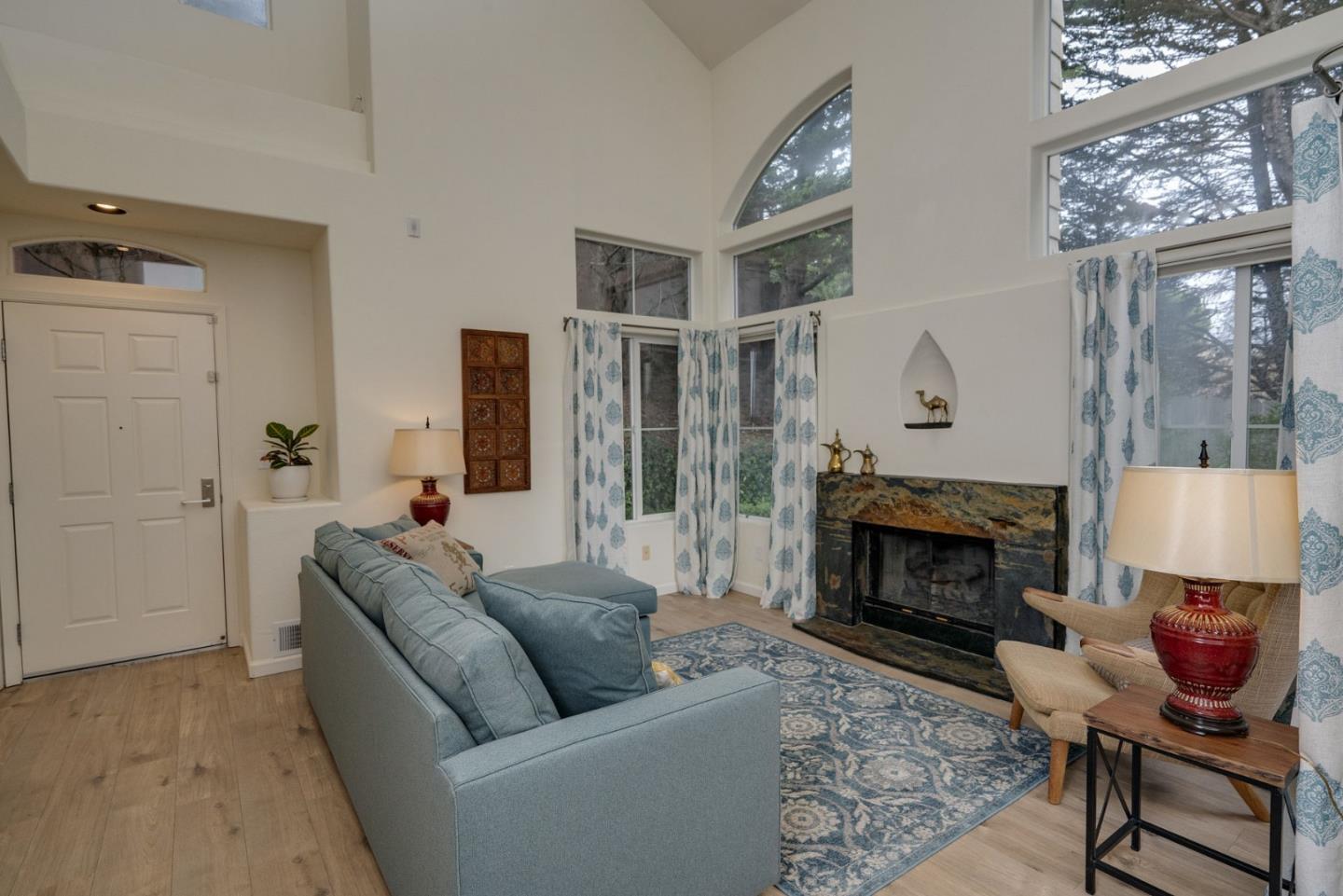 120 Patrick Way Half Moon Bay, CA 94019 - Photo 5 of 22 a living room with furniture and a fireplace