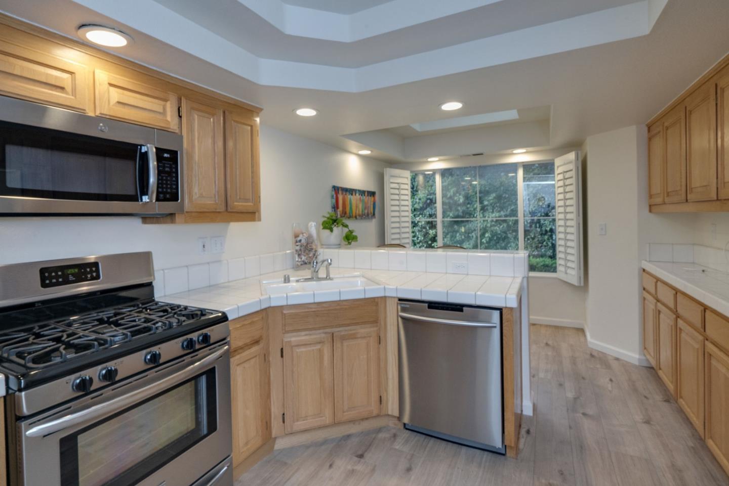 120 Patrick Way Half Moon Bay, CA 94019 - Photo 8 of 22 a kitchen with a stove and a sink