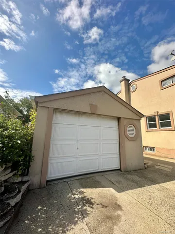 a view of a house with a garage