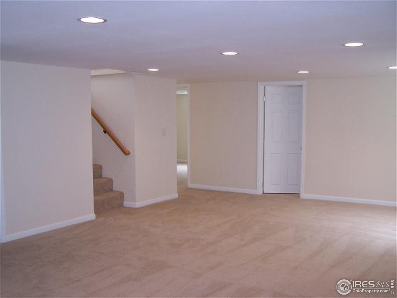 8747 Baseline Road Lafayette, CO 80026 - Photo 10 of 12 a view of an empty room with a window